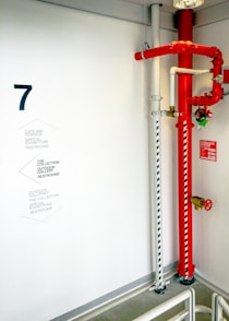 red and white metal pipe