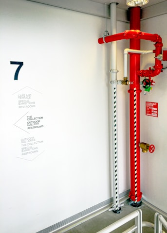 red and white metal pipe