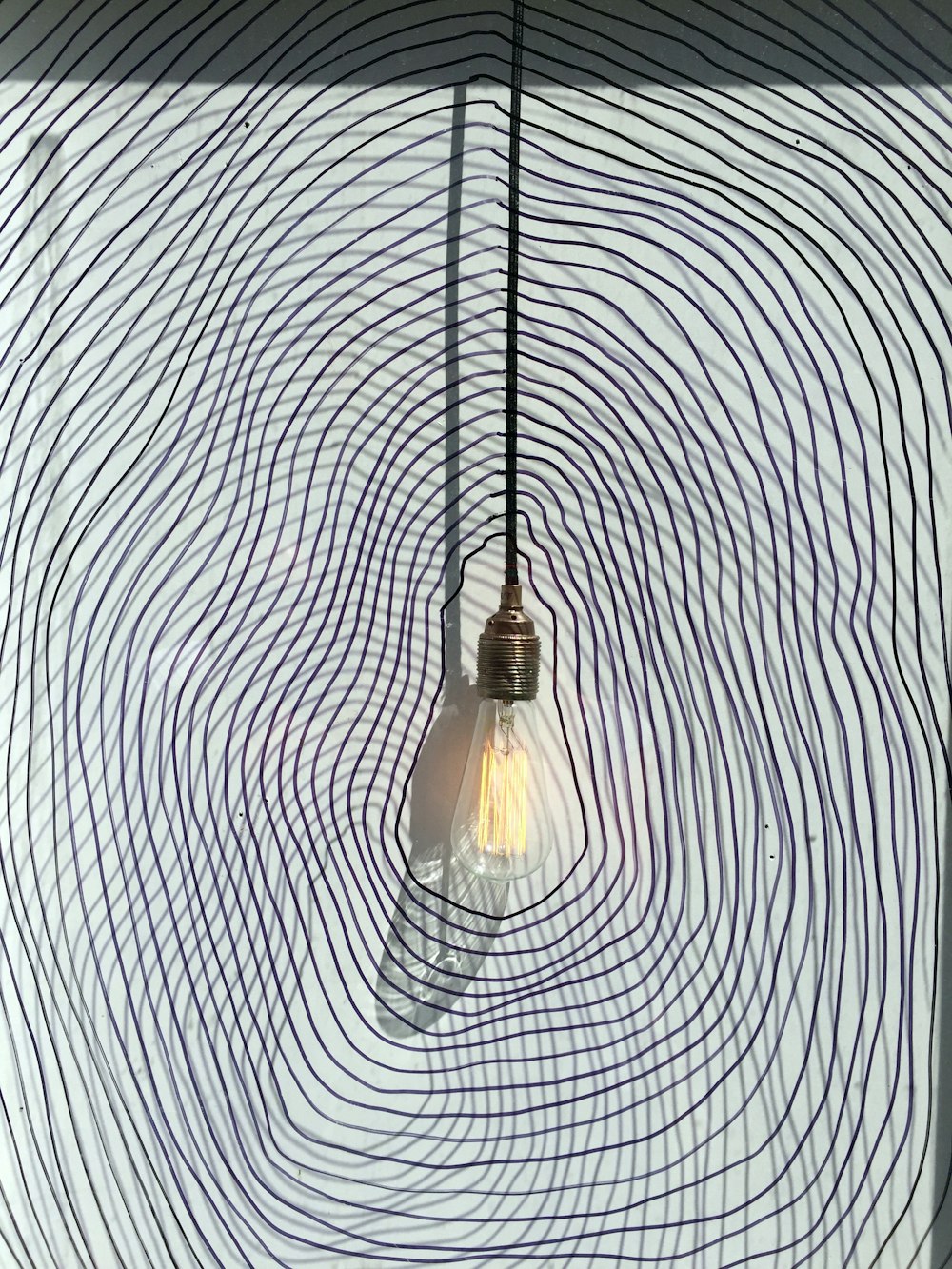 clear glass pendant lamp turned off