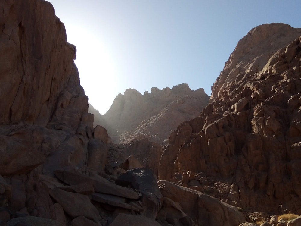 brown rock formation under blue sky during daytime