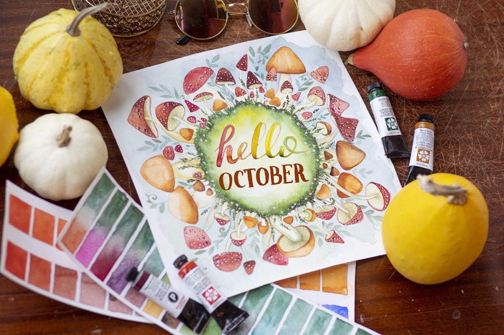 yellow round fruit on white and red floral table cloth