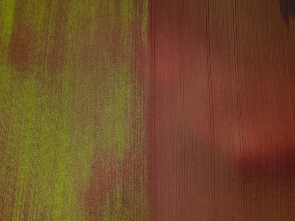 brown and green striped textile