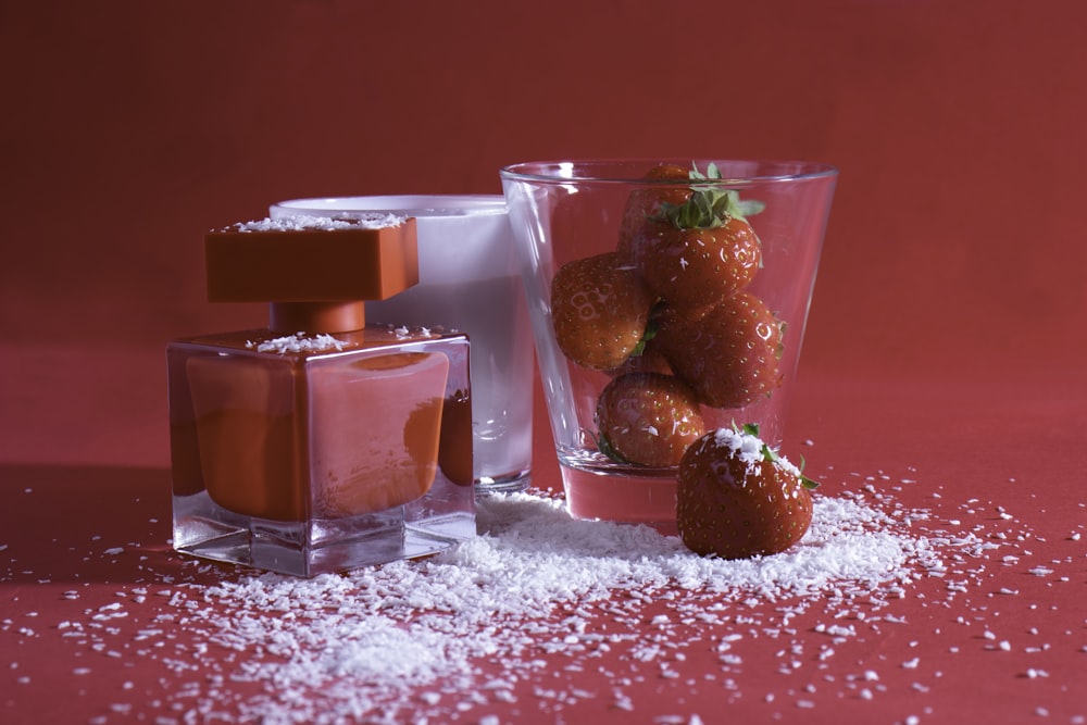 red strawberries in clear drinking glass