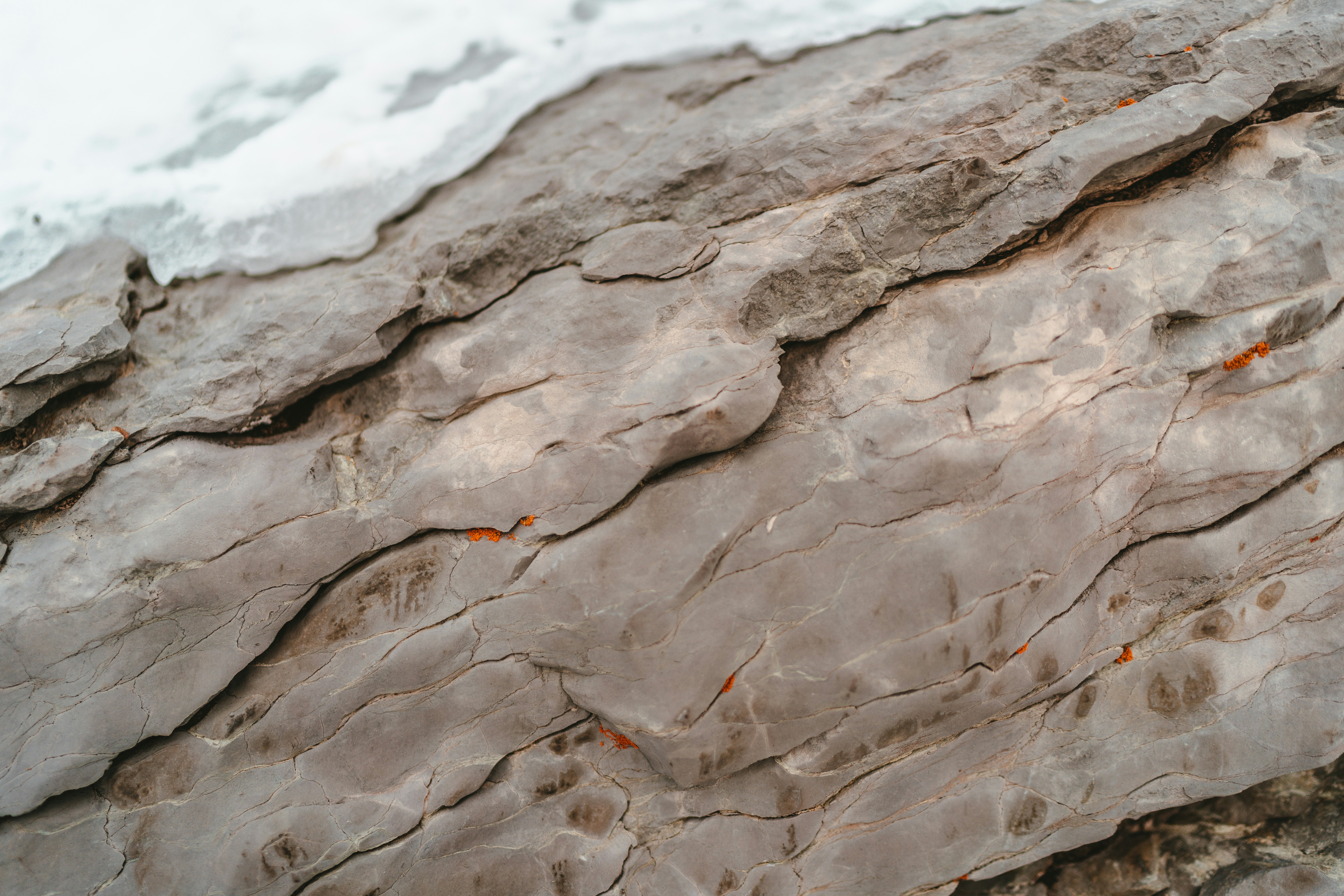 gray and white stone with water