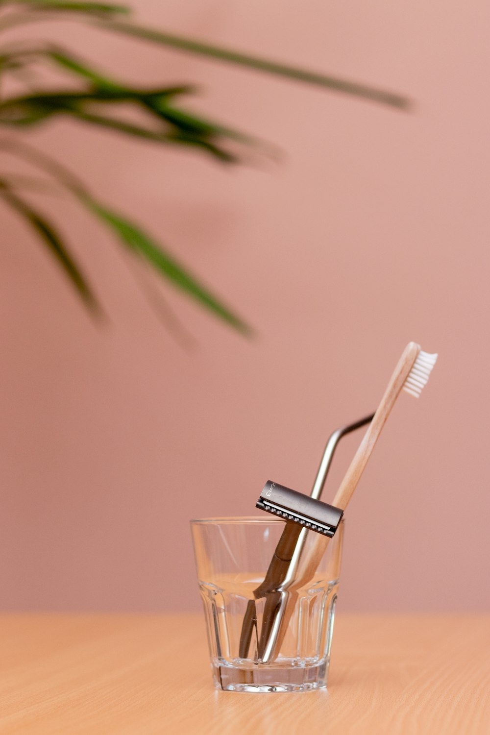 clear drinking glass with brown liquid