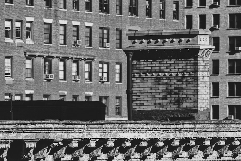 grayscale photo of building with staircase