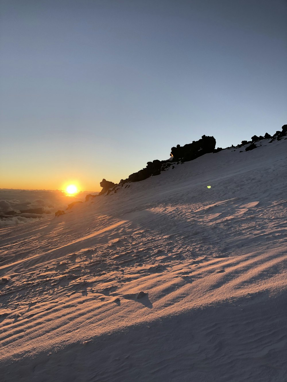 silhouette of mountain during sunset