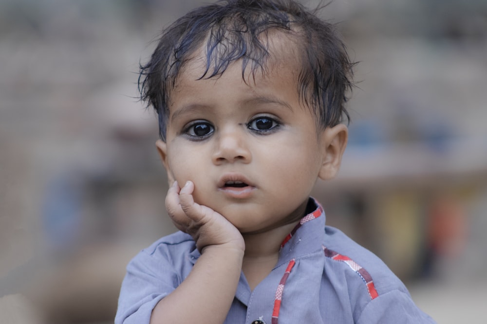 boy in blue polo shirt