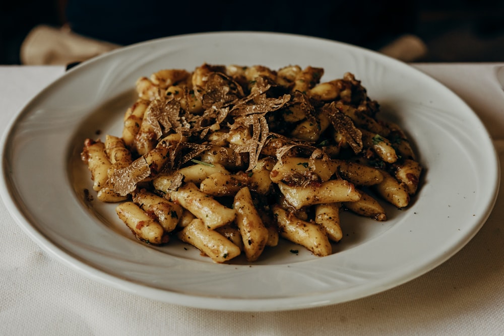 brown food on white ceramic plate