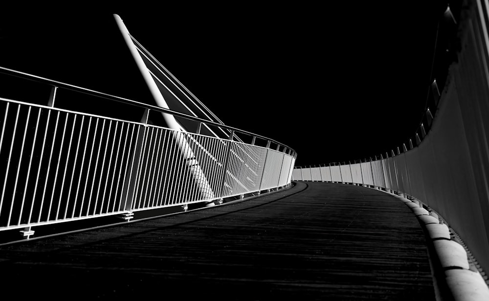 grayscale photo of a bridge