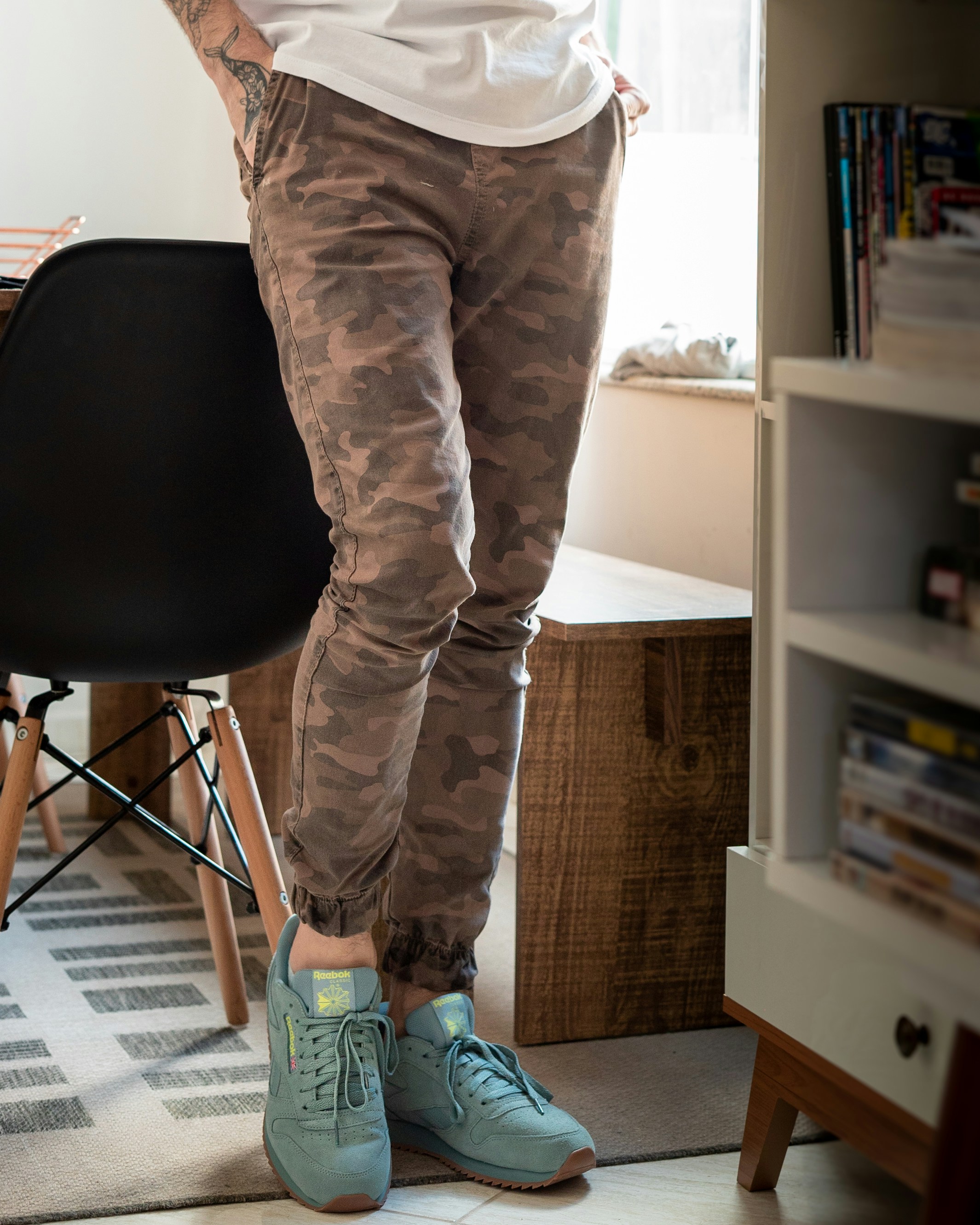 A stylish casual outfit featuring neutral tones and accessories.