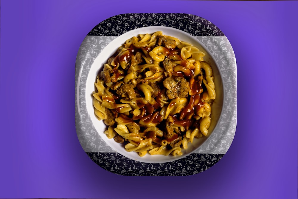 brown and black food on white ceramic plate