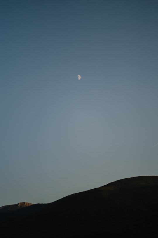 silhouette of mountain under blue sky during daytime in Villavallelonga Italy