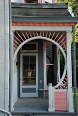 An elegant porch featuring balanced design and architectural detail.