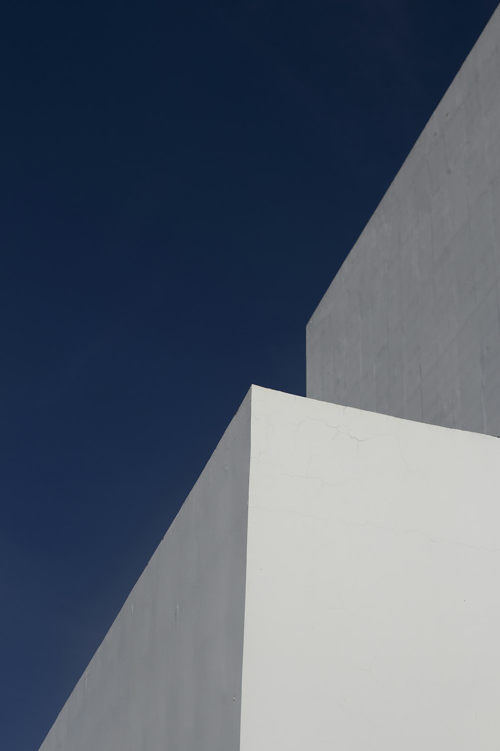 white concrete building under blue sky during daytime