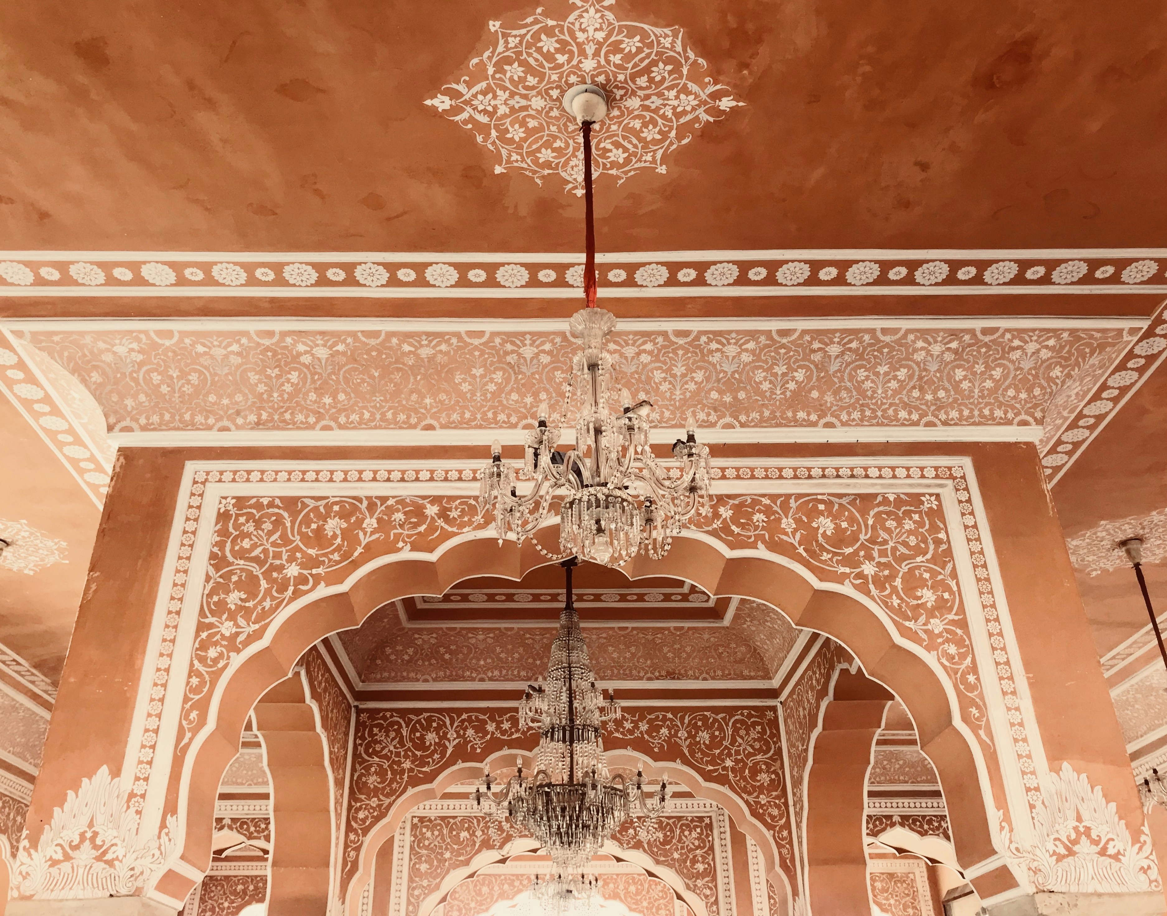 Jaipur restaurant interior with brown and white floral ceiling