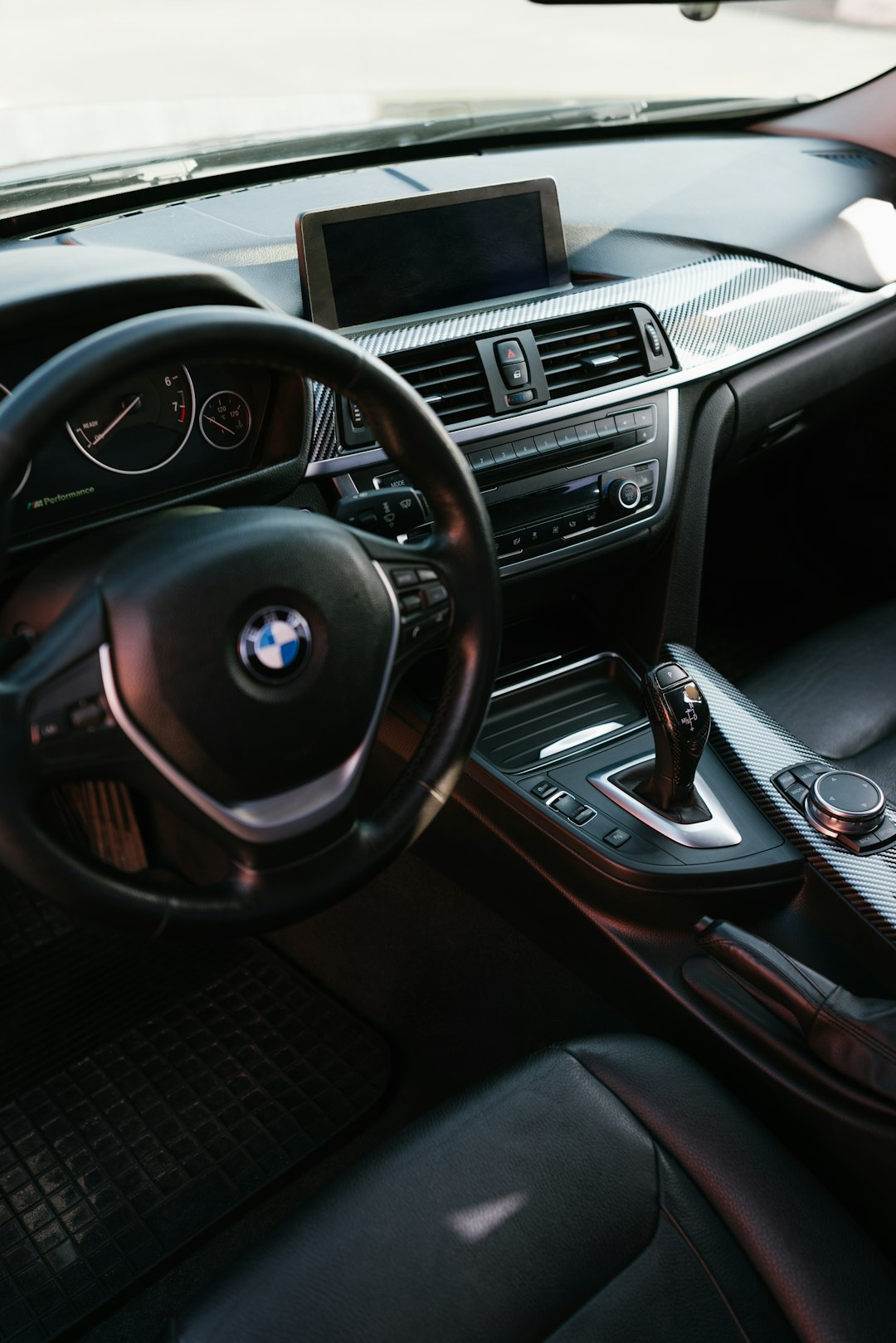 black and silver mercedes benz steering wheel