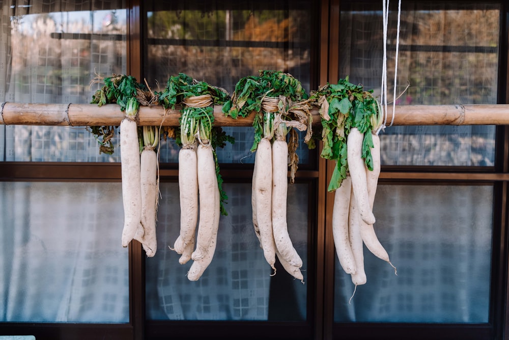 green and white vegetables on glass window