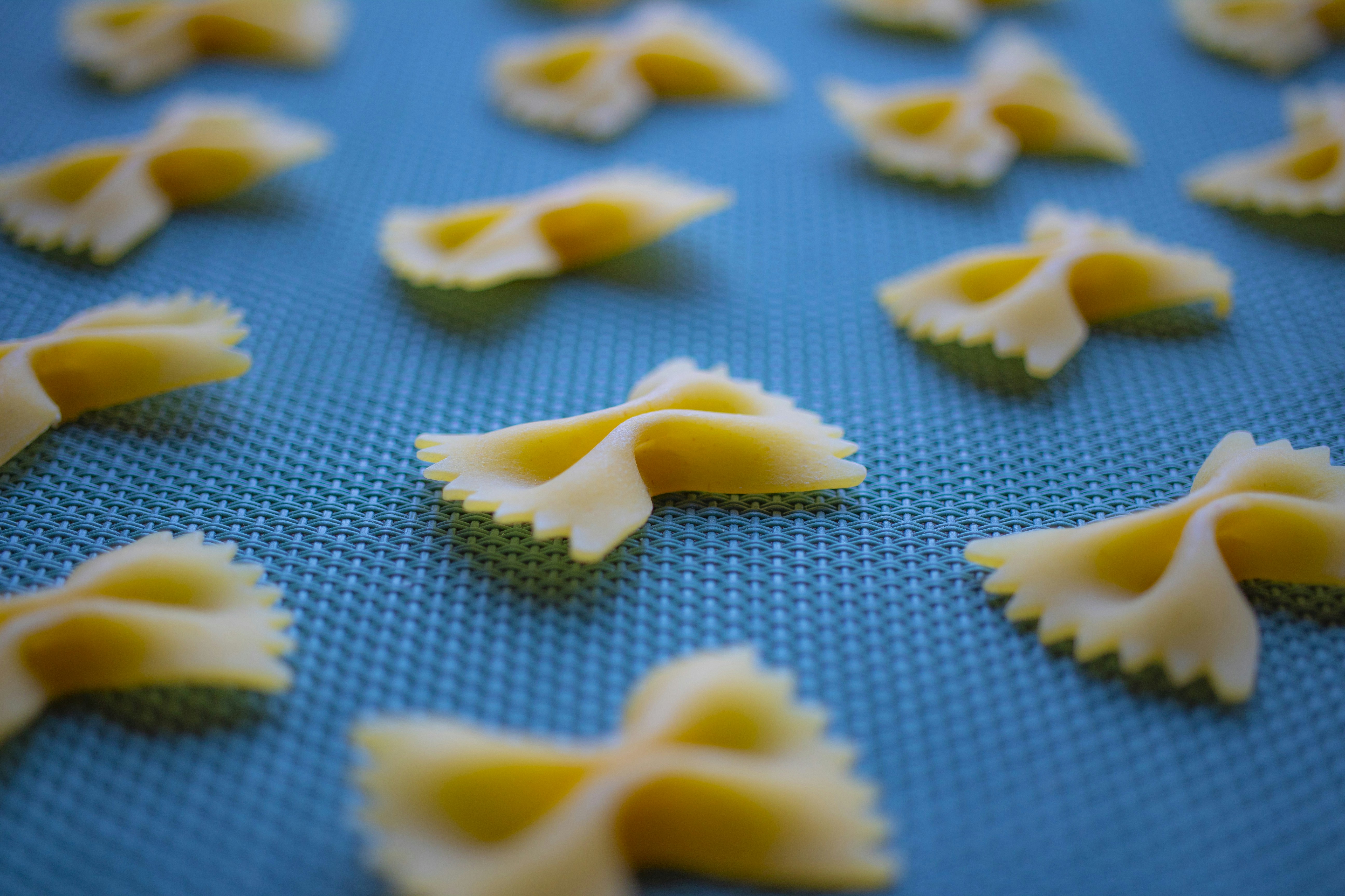 Farfalle on a blue surface