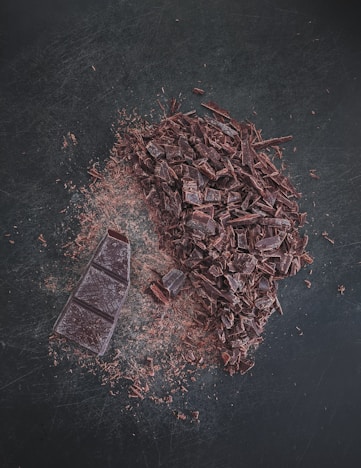 brown dried leaves on black surface