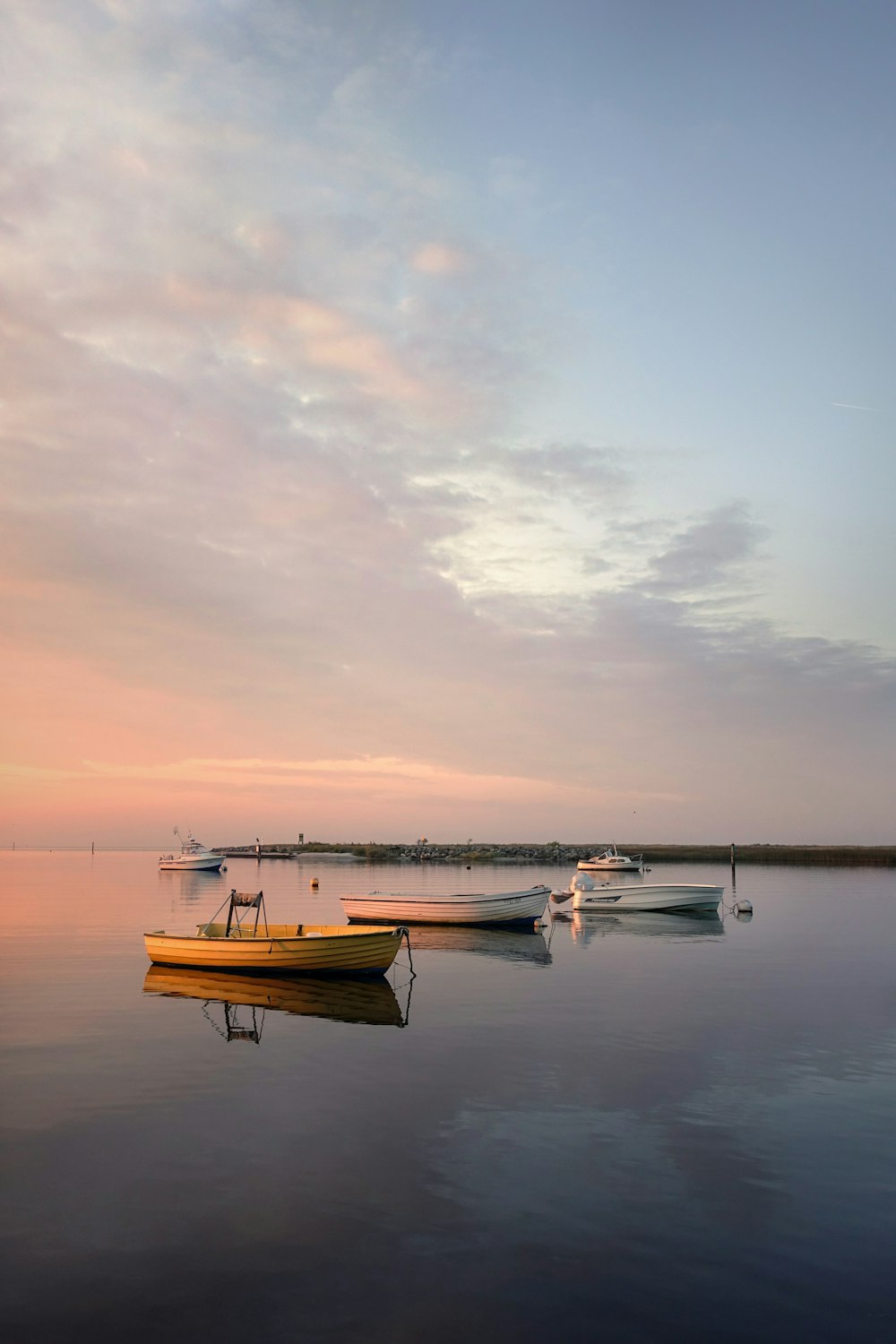 white and brown boat on sea during daytime