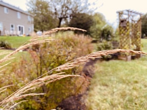 Close-up of natural fibers and wooden elements blending into a modern garden design.