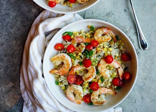 vegetable salad on white ceramic bowl