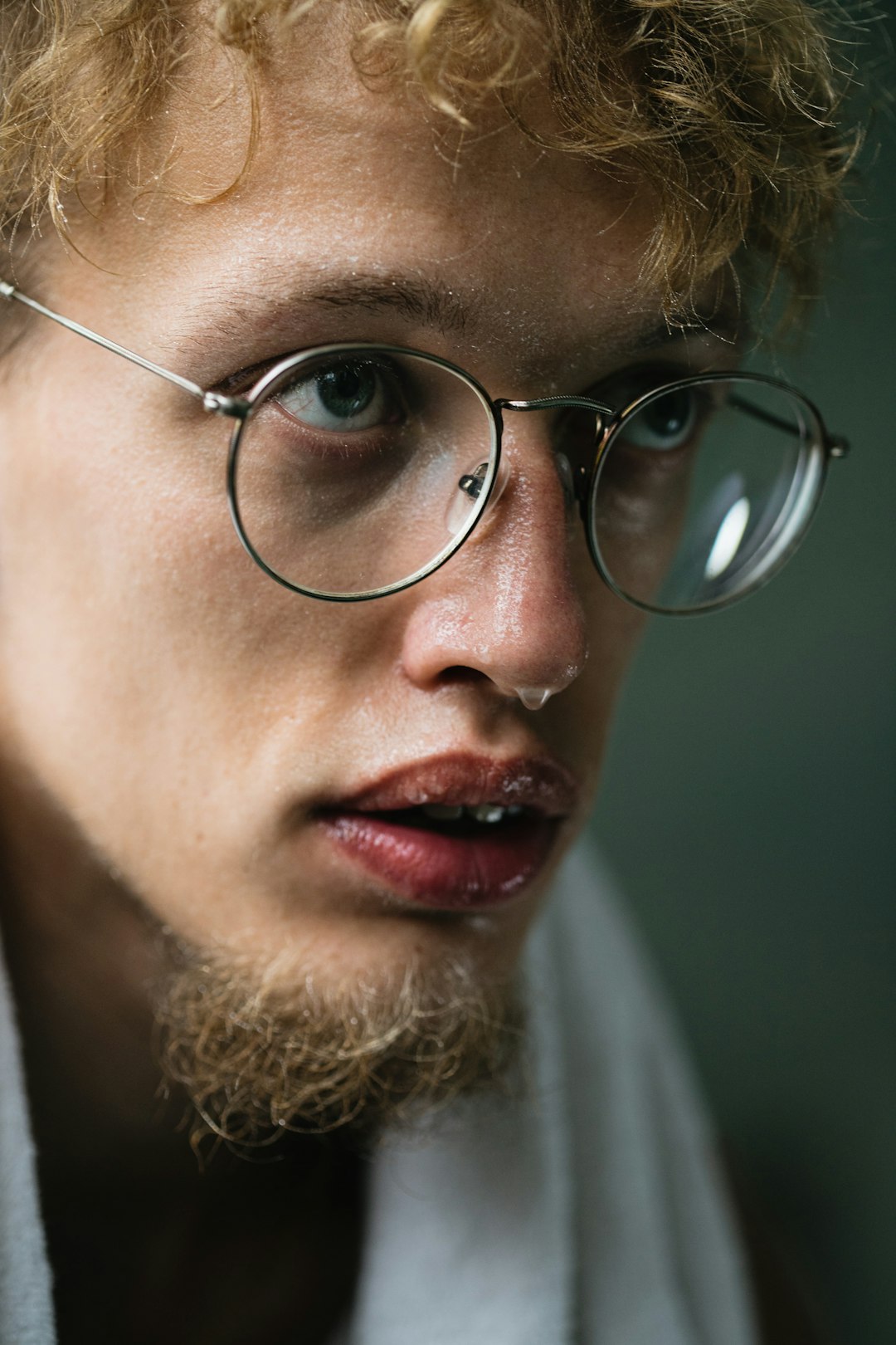 man in silver framed eyeglasses