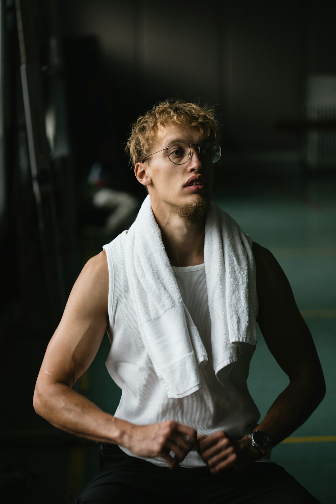 man in white tank top