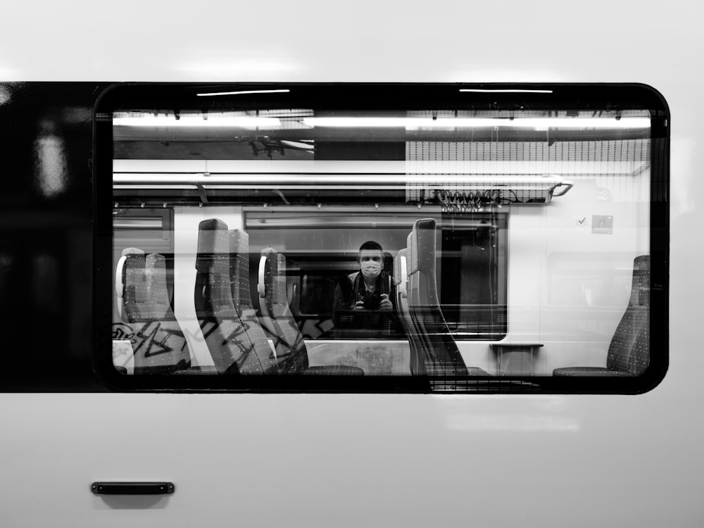 grayscale photo of train window