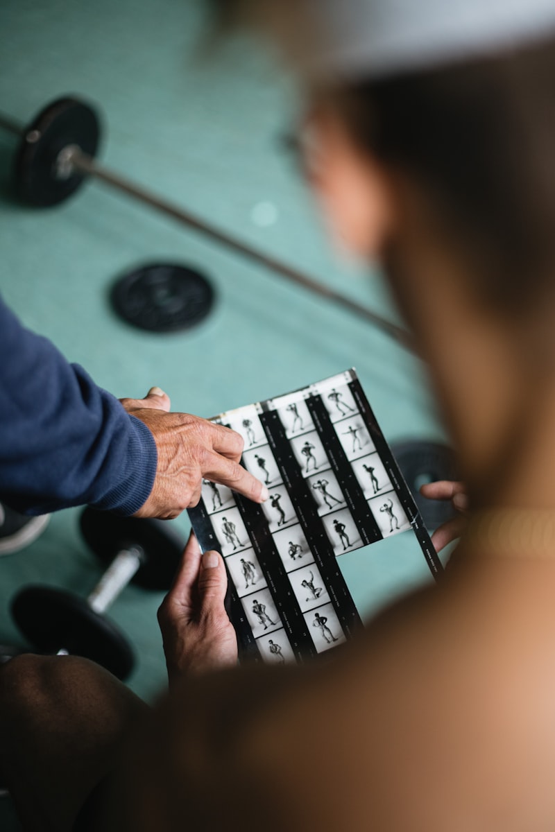 Senior woman strength training with light dumbbells at home