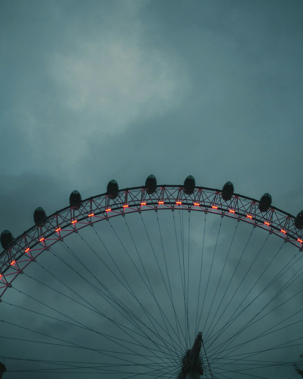 people riding on ferris wheel during daytime