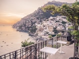 A panoramic view of the Ligurian coastline at sunset, seen from the restaurant’s terrace.