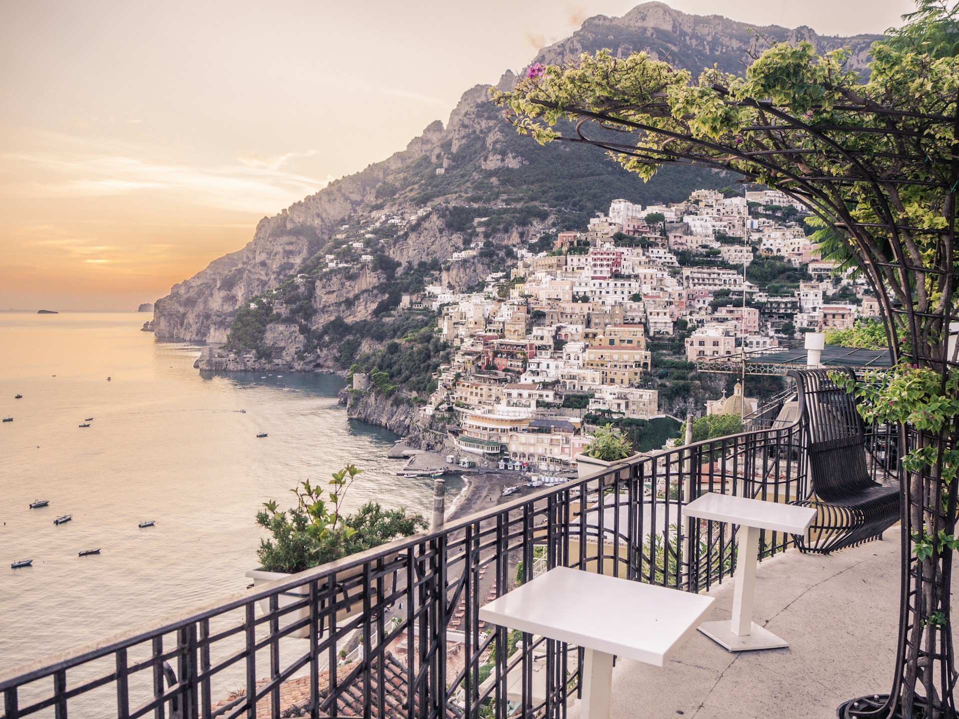 woman wearing yellow long-sleeved dress under white clouds and blue sky during daytime
