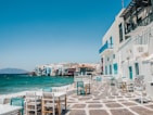 white and brown concrete buildings near sea during daytime