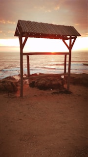 A sunset view of a resilient coastal structure designed to withstand storms.
