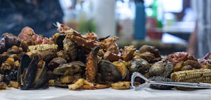A colorful spread of maréa’s seafood boil ingredients laid out before cooking