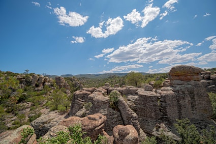 brown rocky mountain under blue sky during daytime