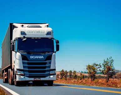 white truck on road during daytime