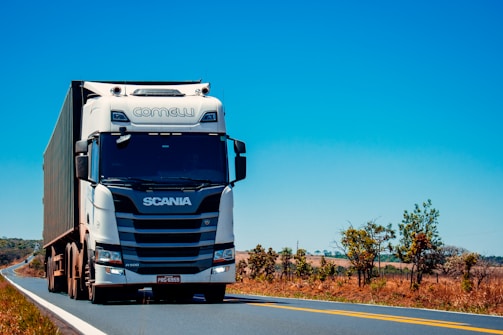 white truck on road during daytime