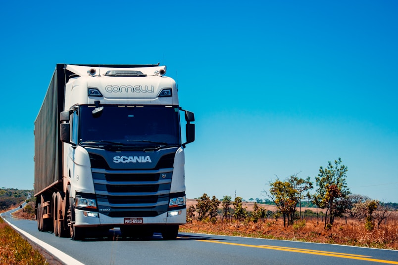 white truck on road during daytime