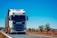 white truck on road during daytime