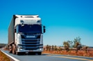 white truck on road during daytime