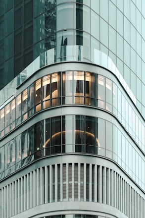 Modern interior architectural design showcasing sleek lines and elegant decor in a high-rise building.