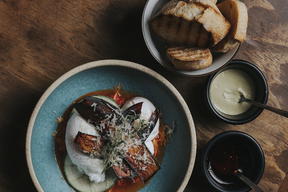 white ceramic bowl with brown bread