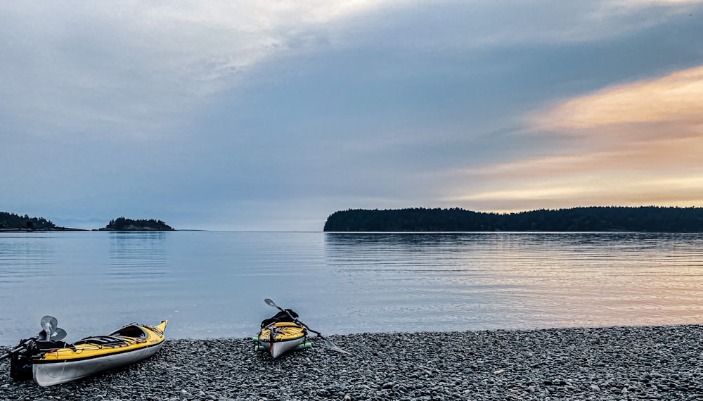 yellow kayak on body of water during daytime