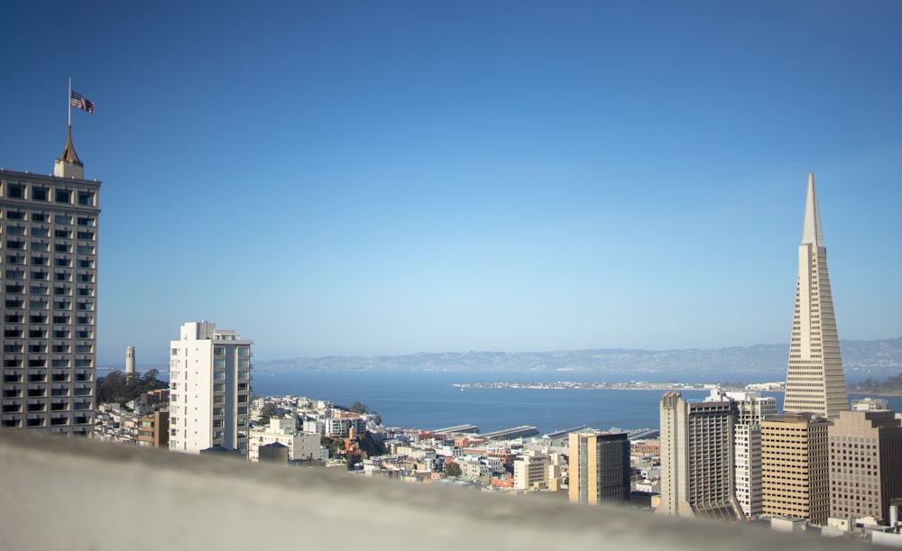 city skyline under blue sky during daytime