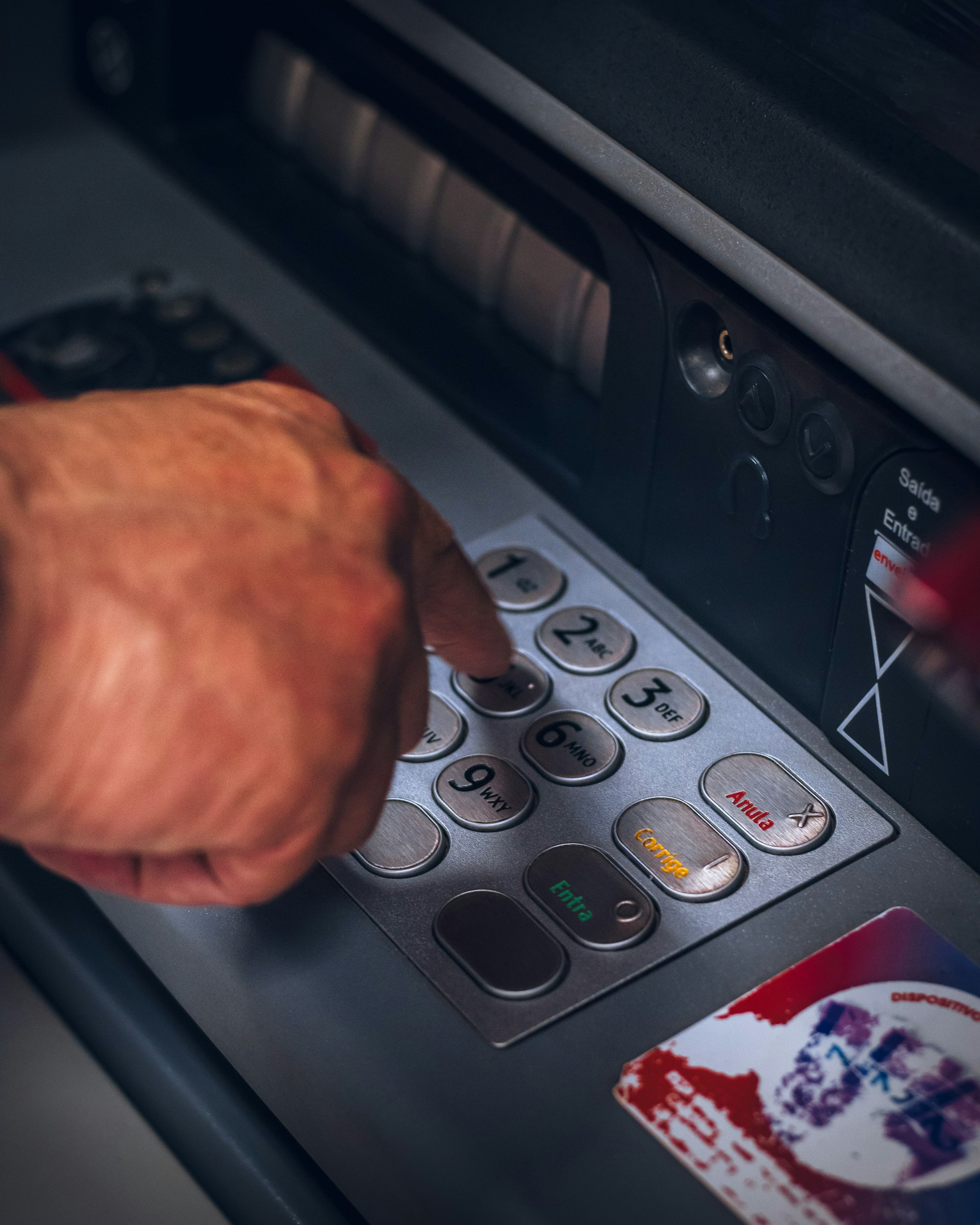 hand - using a ATM - Pressing buttons