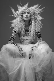 woman in black and white long sleeve dress