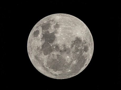 full moon in black background